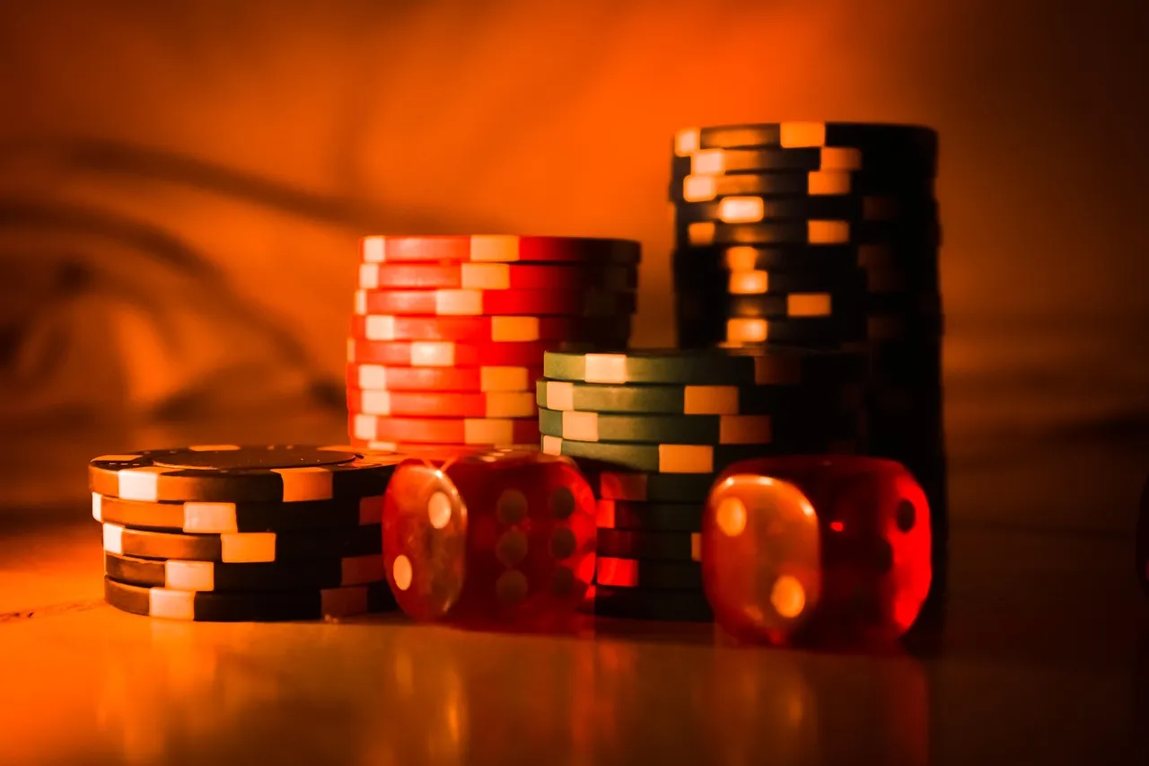 Poker player contemplating bet at table